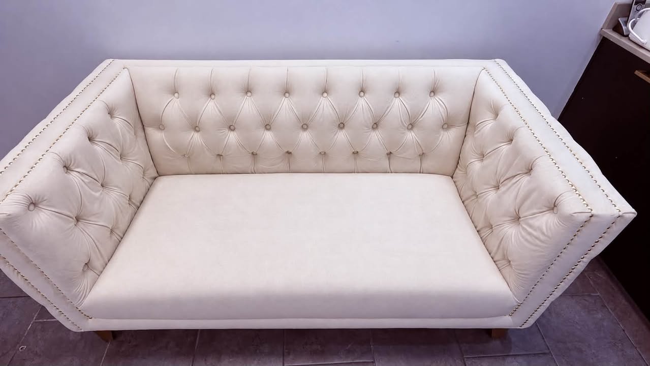 Couch cleaning after photo in Halifax — cream tufted sofa cushion clean and stain-free